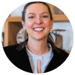 Person smiling beside a testimonial credited to a co-founder on the Partners Coffee product page