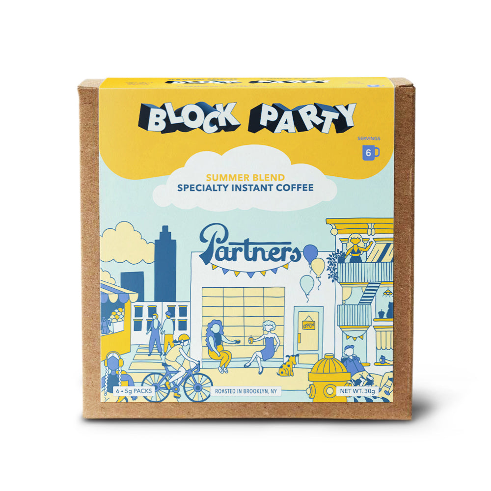 Front view of Block Party specialty instant coffee box showing Summer Blend label and colorful neighborhood illustration on white background