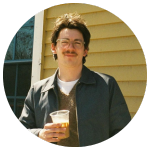 Reviewer headshot next to their quoted testimonial