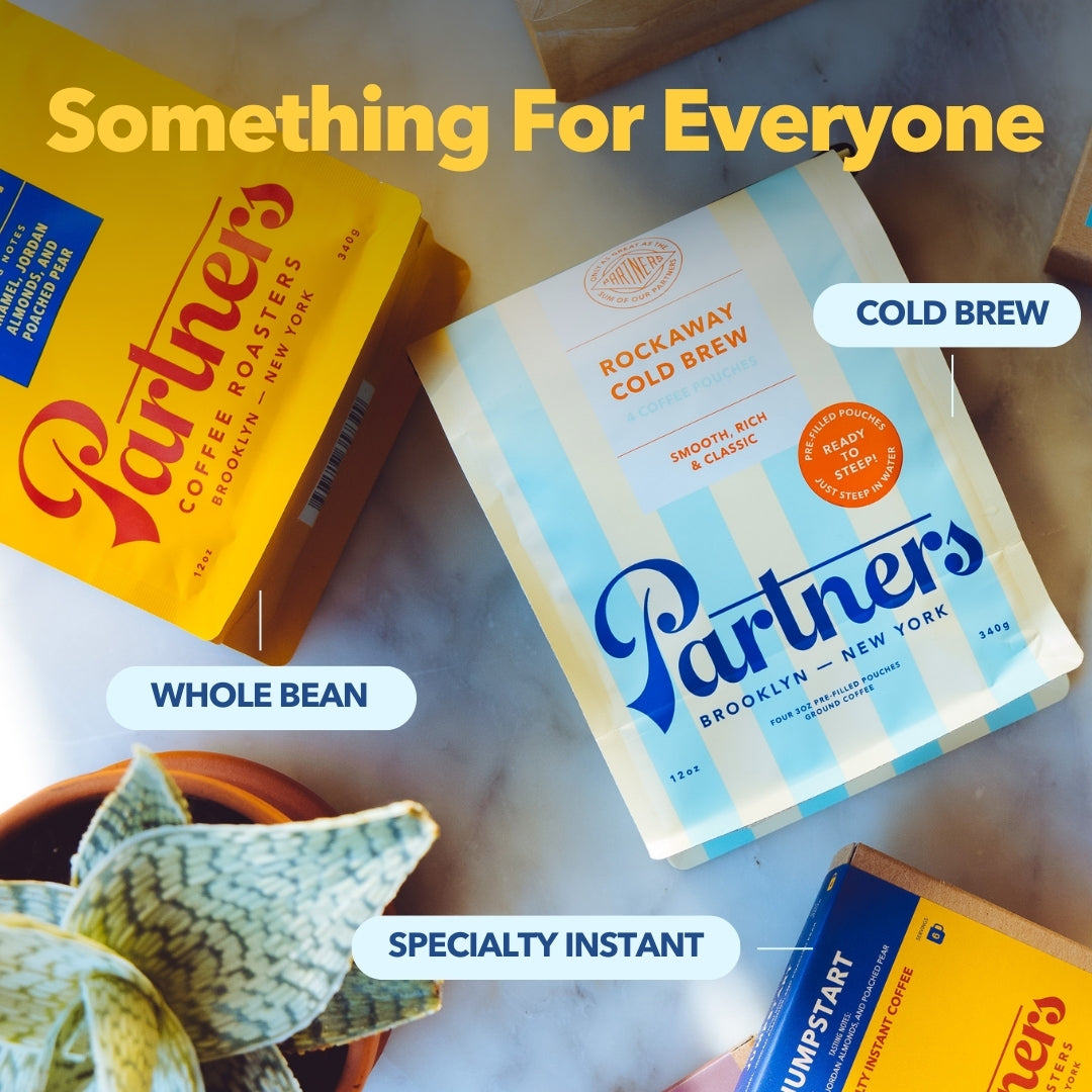 Partners Coffee packages with overlaid headline Something For Everyone and labels Whole Bean Cold Brew Specialty Instant